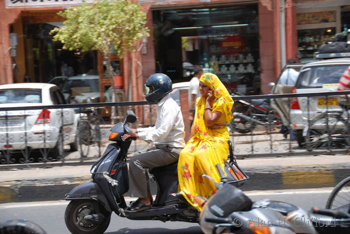On the &rsquo;phone, side saddle, on Johari Bazaar, Jaipur